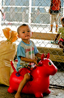 Little boy riding toy
