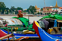 Khmer man on Boat on the Tonle Sap River, Phnom Pehn