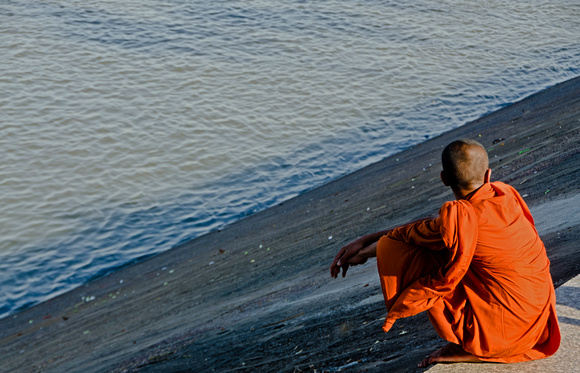Monk on the banks of the Tonle Sap