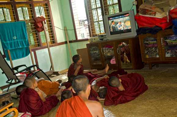 Monks watching TV