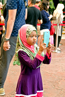 Young girl taking photo