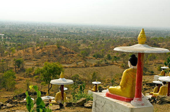 Seated Buddha looking over the Burmese plain
