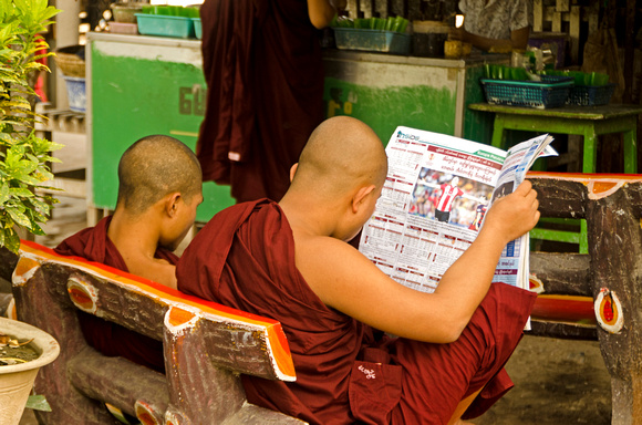 Monk reading Newspaper