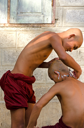 Novice Monk Shaving others head