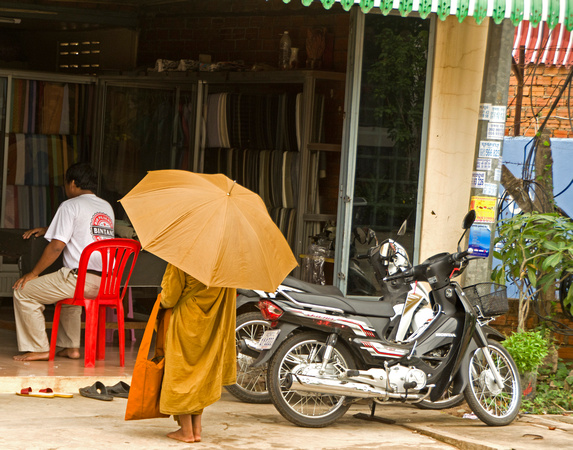 Monk at tailors