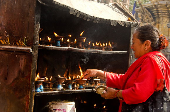 Lighting the butter lamps