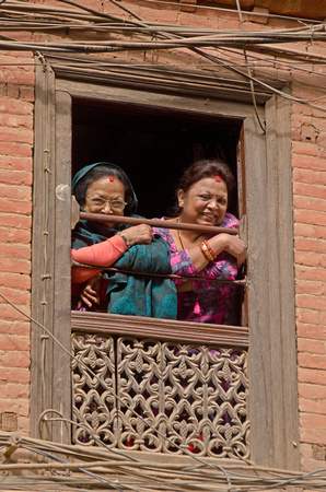 Two ladies in window