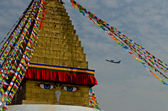 Bodhanath  Buddha eyes with airplane