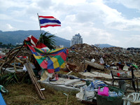 Thai flag over landfill Patong Beach