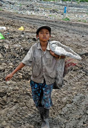 small worker at the dump