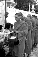 Monks collecting food Luang Prabang.B&W