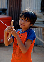 Burmese boy flying kite